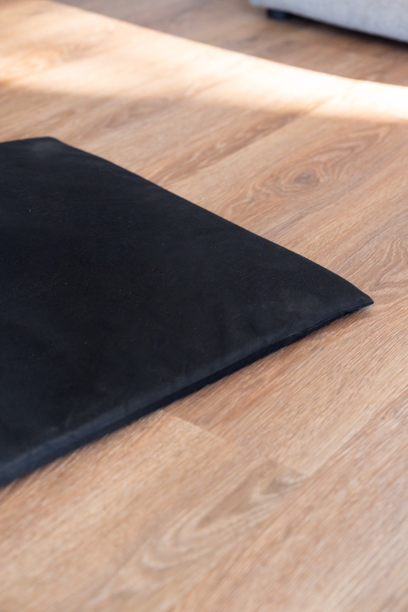 Close-up of the Robust Comfort Mat showing its cushioned design.