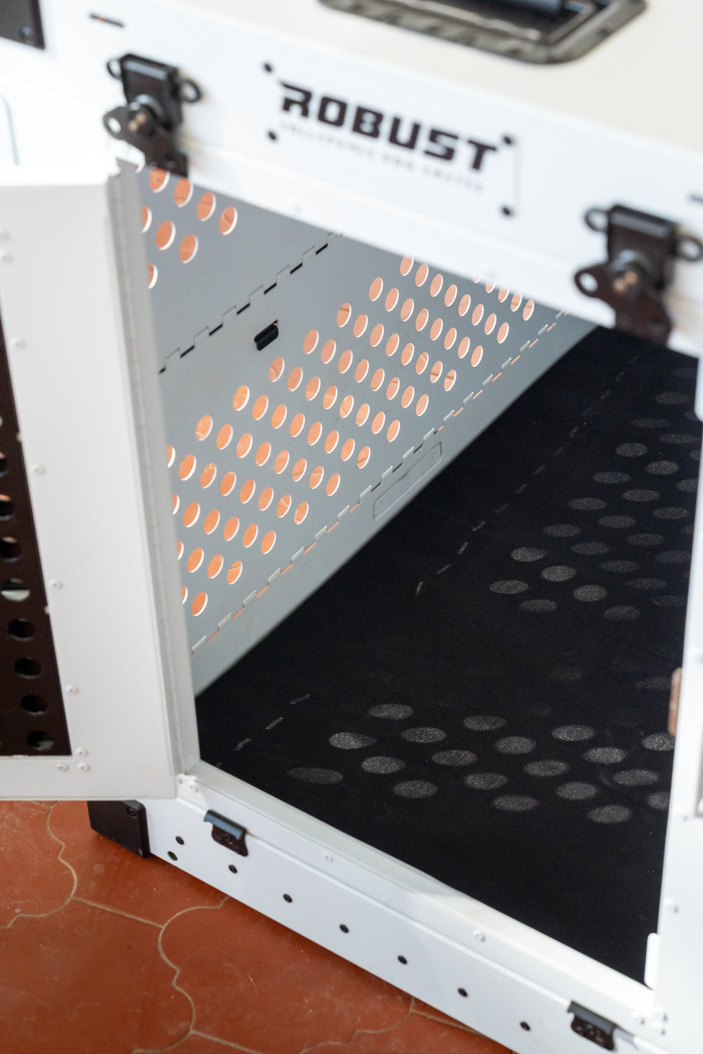 Robust Comfort Mat installed inside a white Robust collapsible dog crate.
