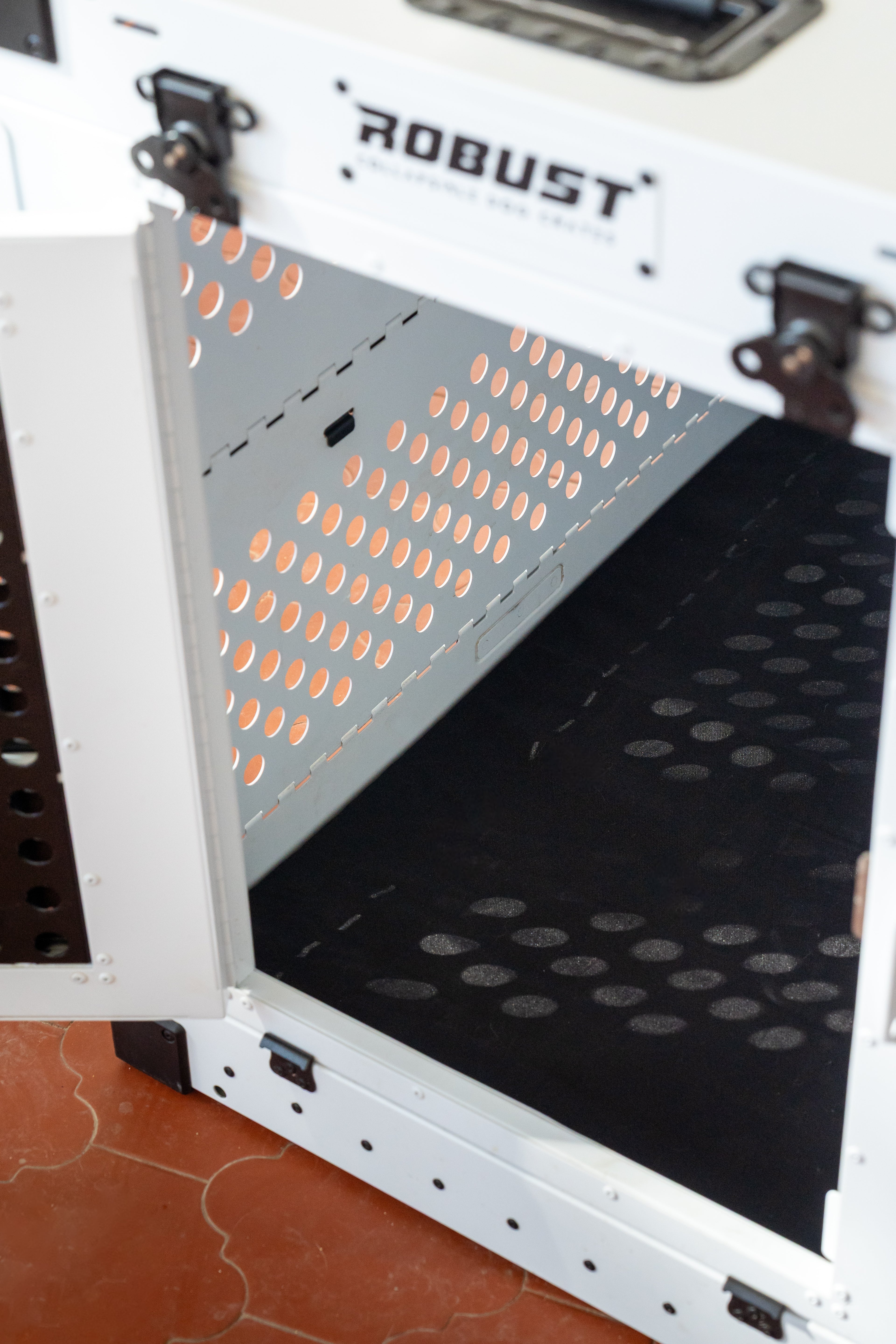 Robust Comfort Mat installed inside a white Robust collapsible dog crate.